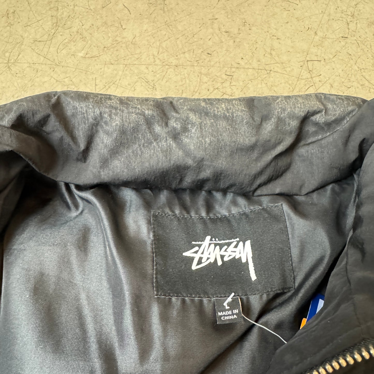 (L) Stüssy Logo Stick Pufferjacke Black